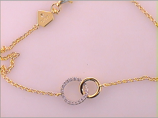 1/12CTW-DIA BRACELET--LARGE INTERLOCKING CIRCLES Daisy Joyeria