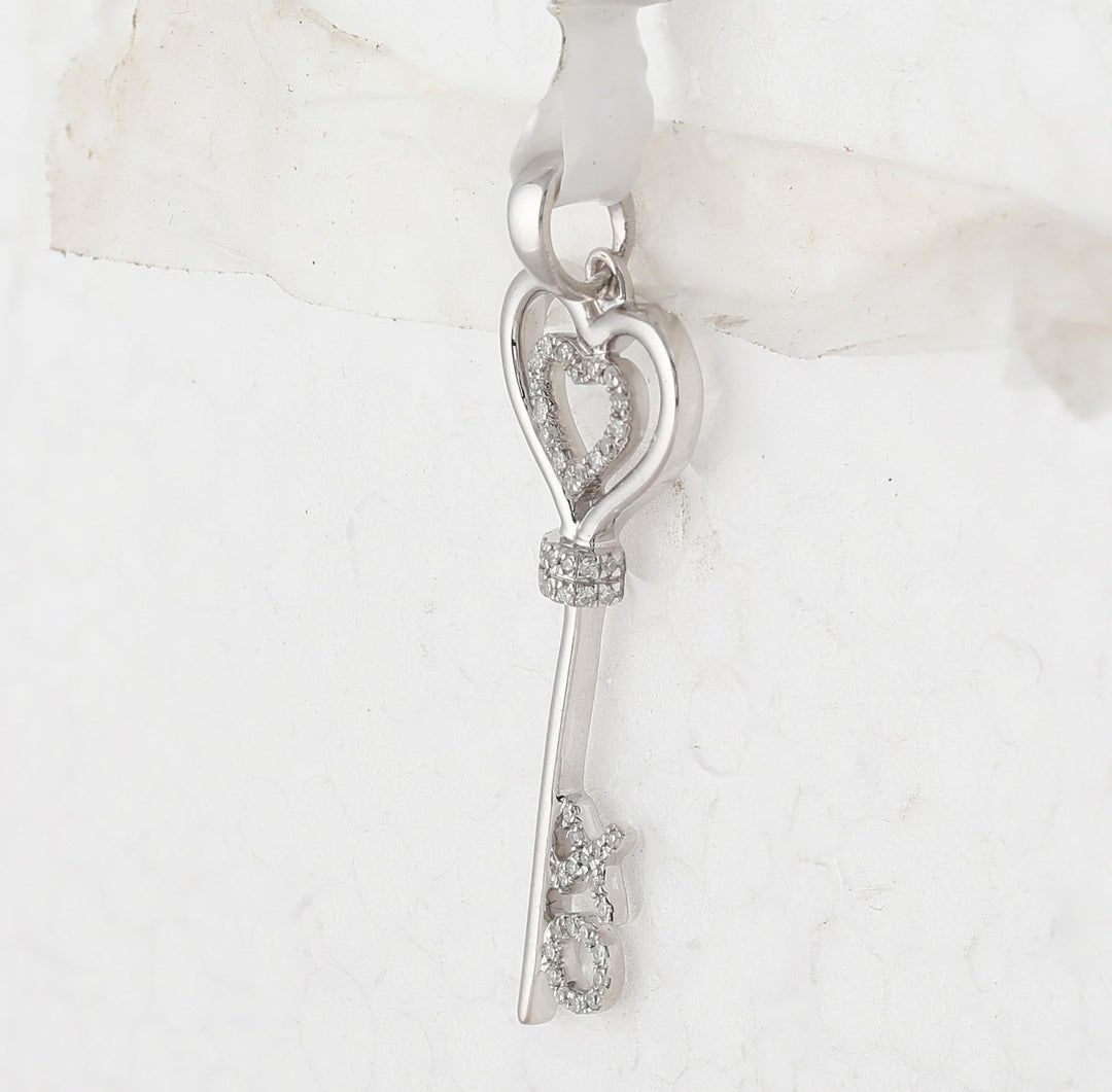 Sterling Silver Womens Round Diamond Heart Key Pendant 1/8 Cttw Daisy Joyeria